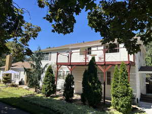 View of property exterior with a balcony