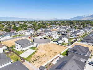 Aerial view of residential area featuring mountains