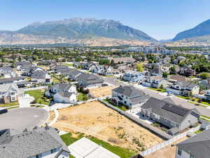 Aerial view of residential area featuring mountains