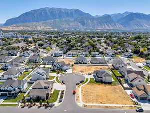 Aerial view of residential area with a mountainous background