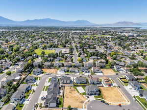 Aerial view of residential area featuring mountains