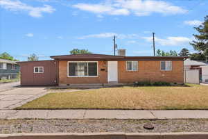 Ranch-style home with crawl space and brick siding