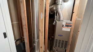 Utility room with heating unit, the house is wired for AC if you want to add it