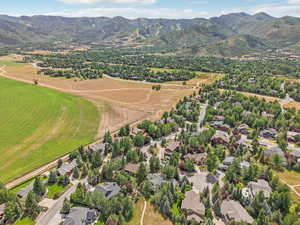 Aerial view of residential area featuring mountains