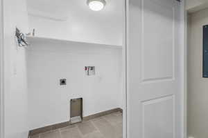 Laundry room featuring washer hookup and electric dryer hookup