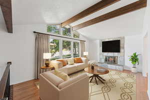 Virtual Staging - Beautiful wood beams and natural lighting coming into the main floor living/family room.