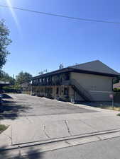 View of building exterior featuring stairway