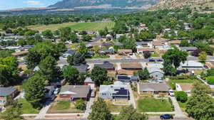 Aerial view of residential area with a mountainous background