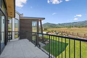 Balcony with a mountain view and a view of rural / pastoral area