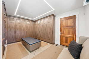 Bedroom with light tile patterned floors