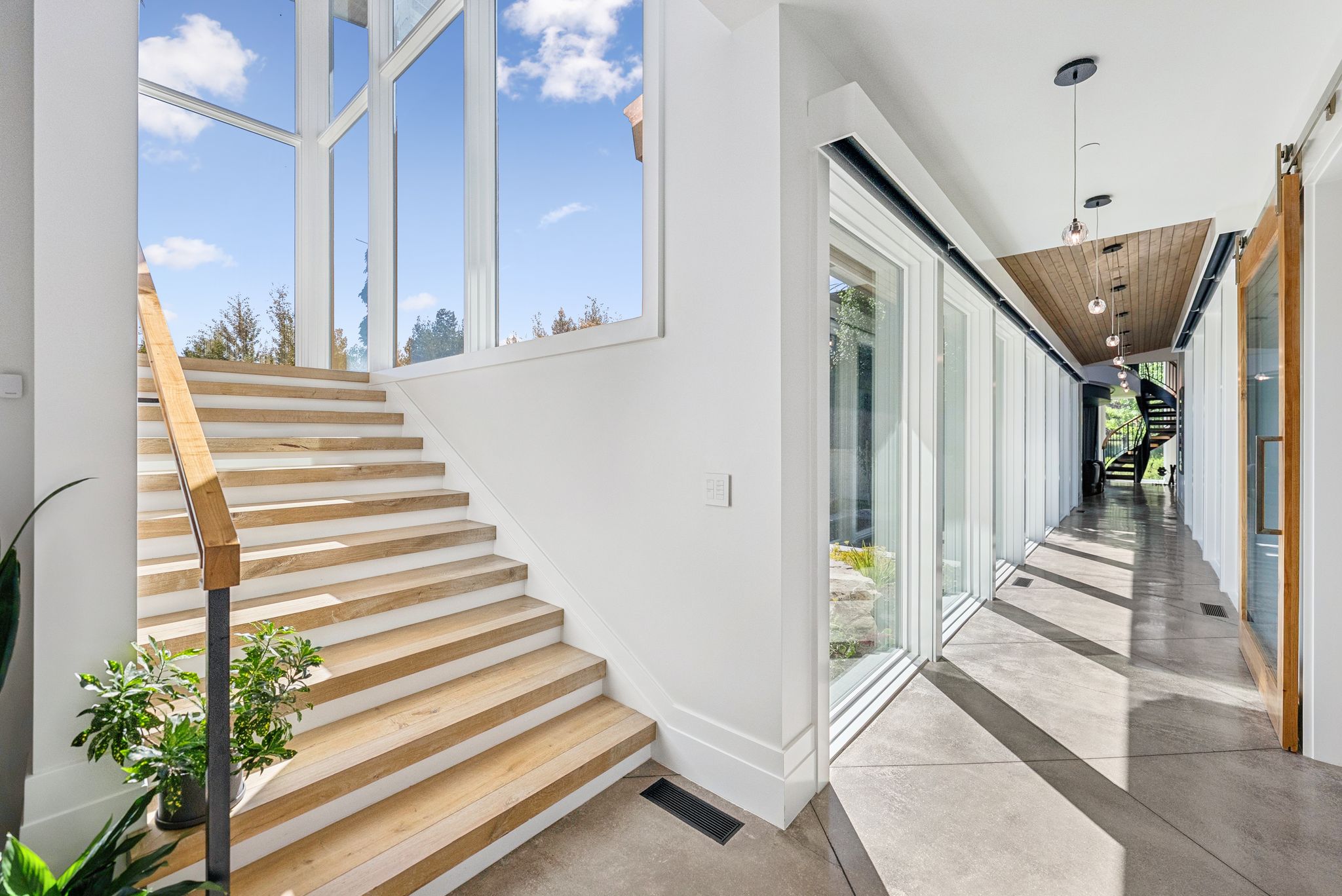 Staircase with concrete flooring