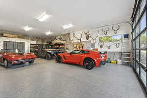 Garage featuring electric panel