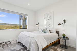 Bedroom featuring baseboards and recessed lighting