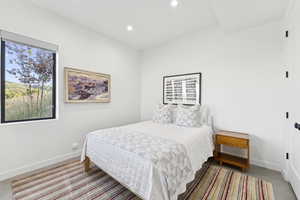 Bedroom featuring baseboards and recessed lighting