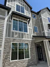 View of home's exterior featuring brick siding