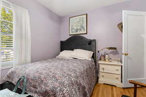 Bedroom featuring light wood-type flooring