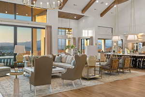 Building lobby with high vaulted ceiling, beamed ceiling, and a mountain view