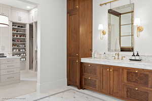 Bathroom featuring vanity and recessed lighting