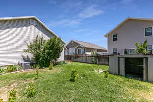 View of yard with a shed