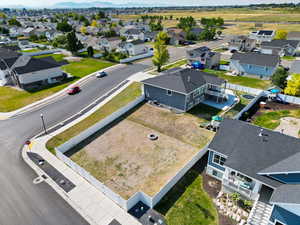 Aerial view of residential area with a mountainous background