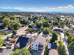 Aerial view of residential area featuring a mountain backdrop