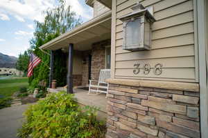 Porch featuring a mountain view