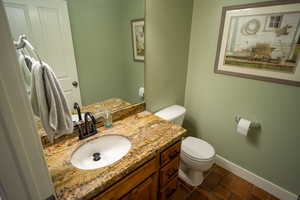 Bathroom featuring toilet and vanity