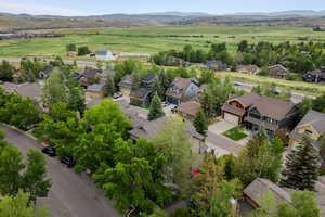 Aerial view of residential area featuring mountains