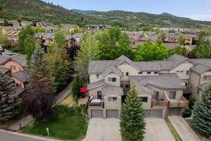 Aerial view of residential area with a mountainous background