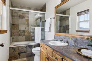Bathroom with vanity and tiled shower / bath