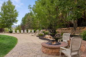 View of patio / terrace with a fire pit