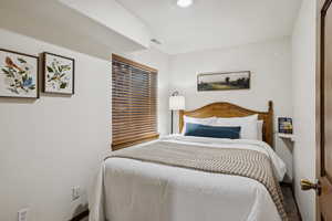 Bedroom featuring recessed lighting