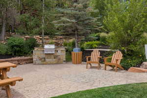 View of patio featuring an outdoor kitchen
