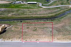 Aerial overview of property's location featuring property boundaries highlighted