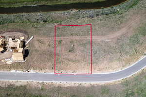 Aerial view of property's location featuring property parcel outlined