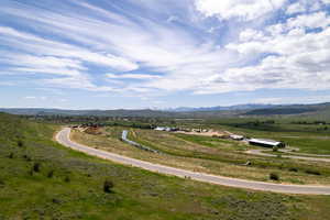 Aerial view of sparsely populated area featuring a mountain backdrop