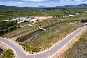Overview of rural landscape with a water and mountain view