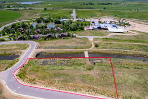 Aerial view of sparsely populated area with a nearby body of water