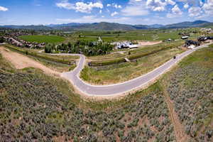 Aerial view of sparsely populated area with a mountainous background