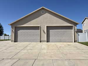 Garage featuring driveway