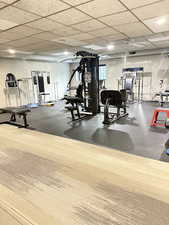 Workout area featuring baseboards