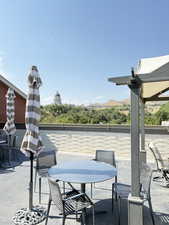 View of patio with outdoor dining area