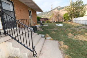 View of yard featuring a mountain view