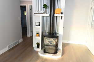 Detailed view of wood finished floors and baseboards