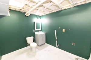 Bathroom featuring toilet and vanity