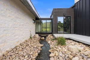 View of home's exterior featuring stone siding