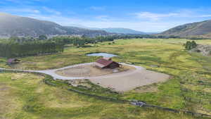 View of mountain background featuring rural landscape