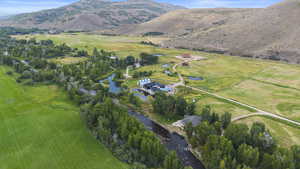 Aerial overview of property's location featuring rural landscape and mountains