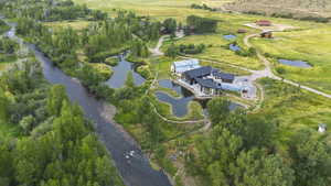 Aerial overview of property's location featuring a large body of water