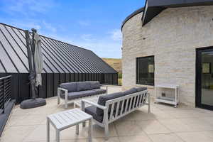 View of patio with outdoor lounge area